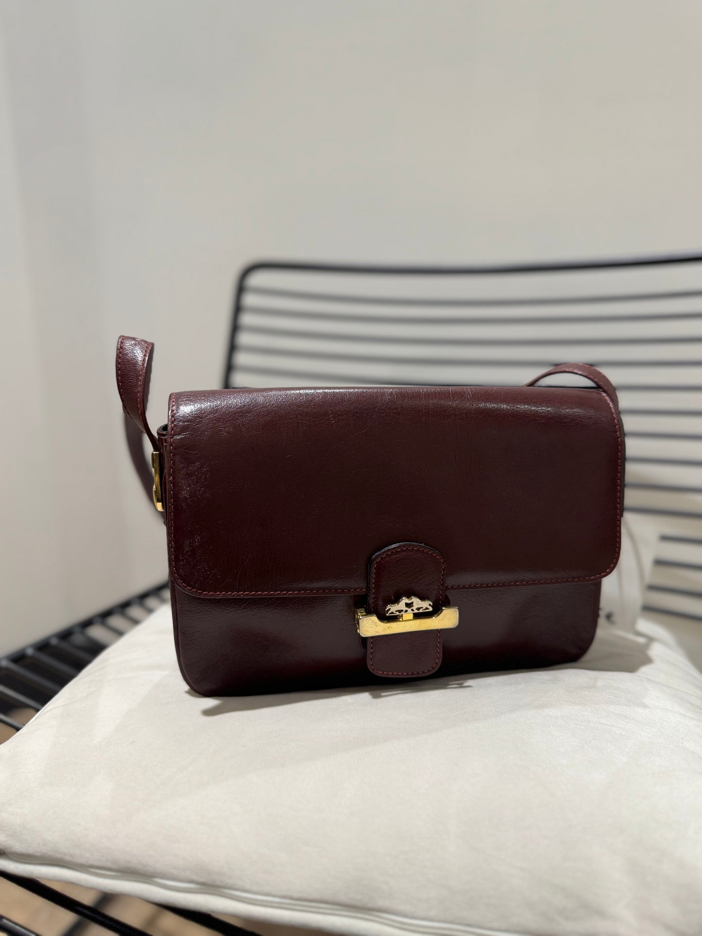 Sac vintage en cuir bordeaux