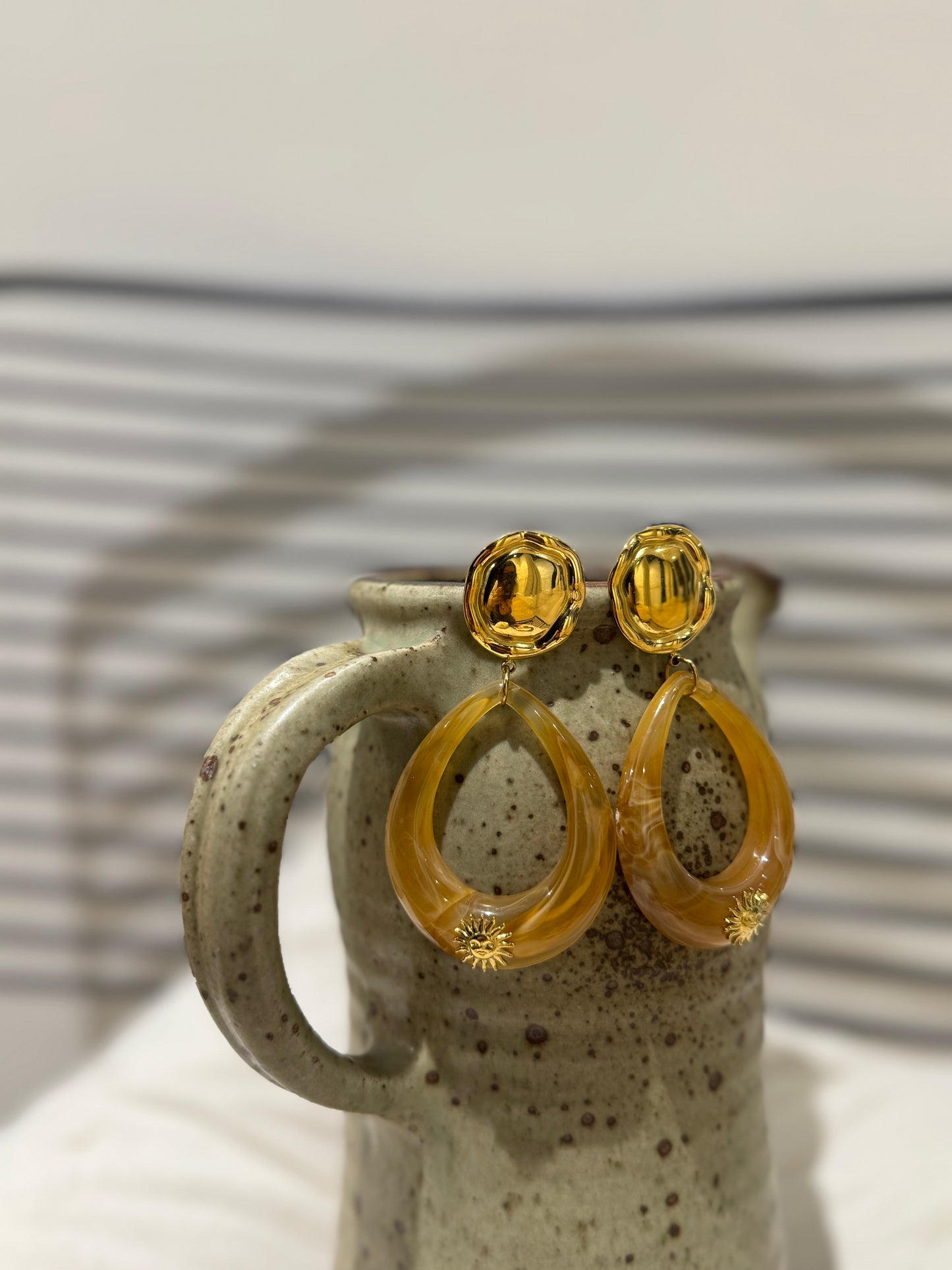 Boucles d’oreille soleil