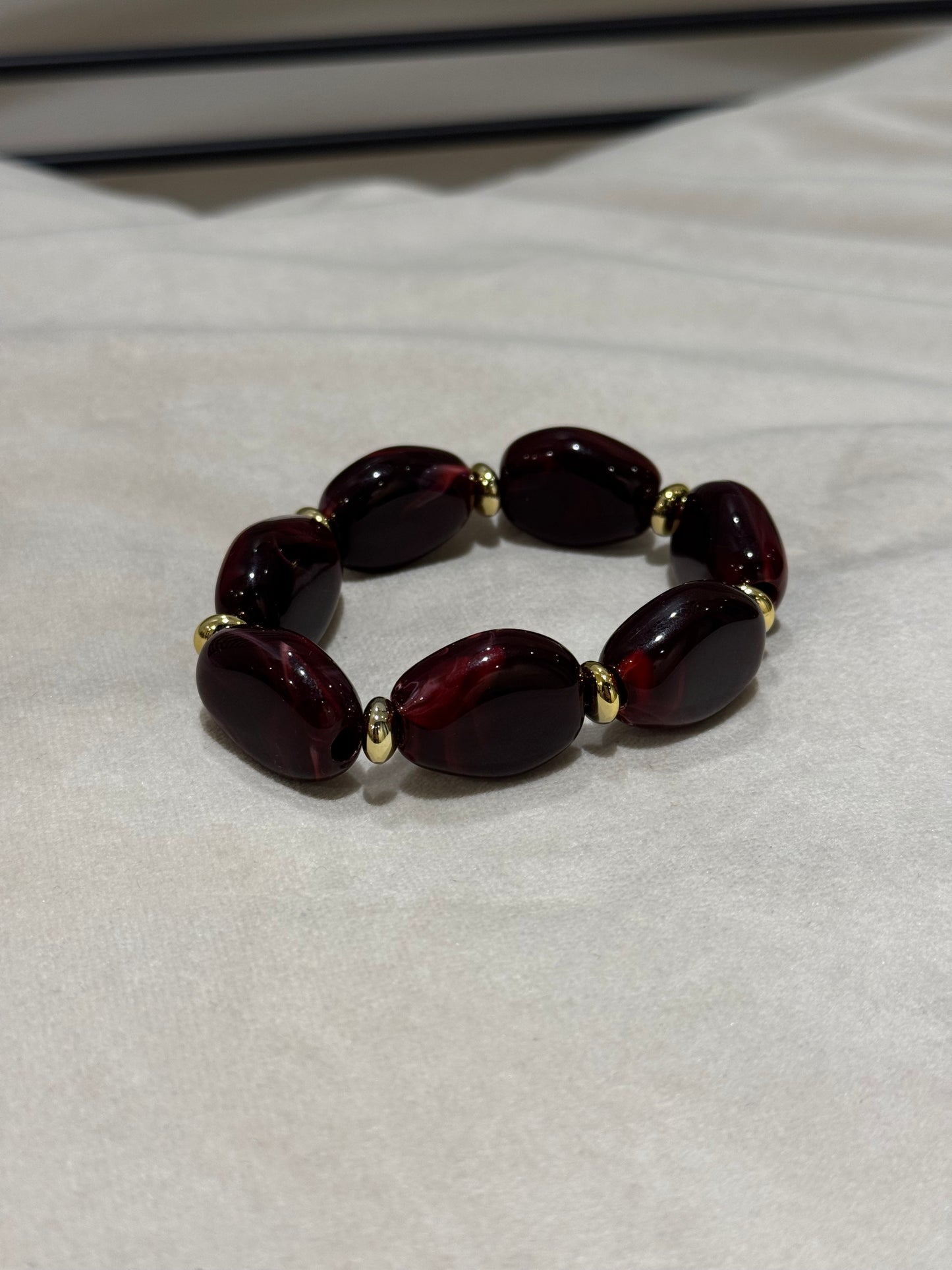 Bracelet perles ovales bordeaux