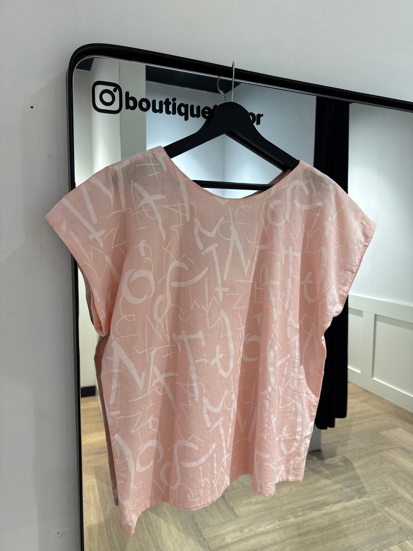 Top vintage à motifs L