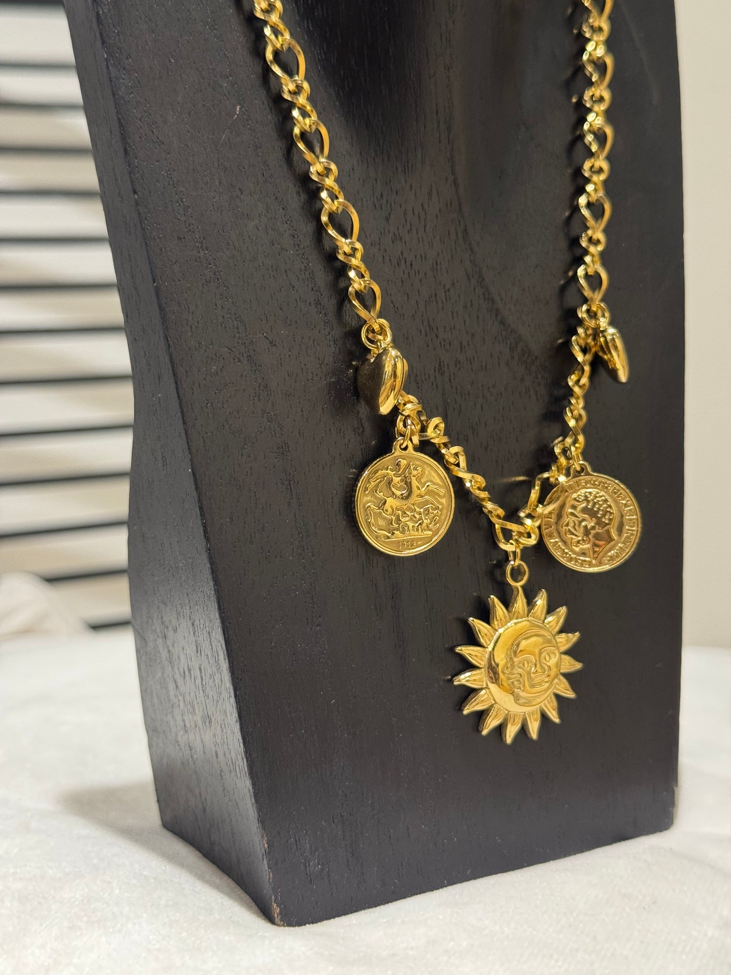 Collier à breloques soleil