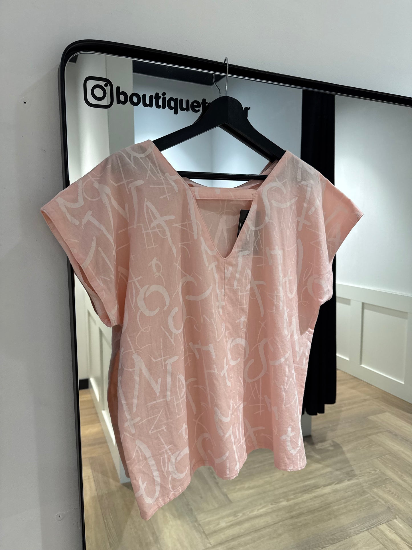 Top vintage à motifs L