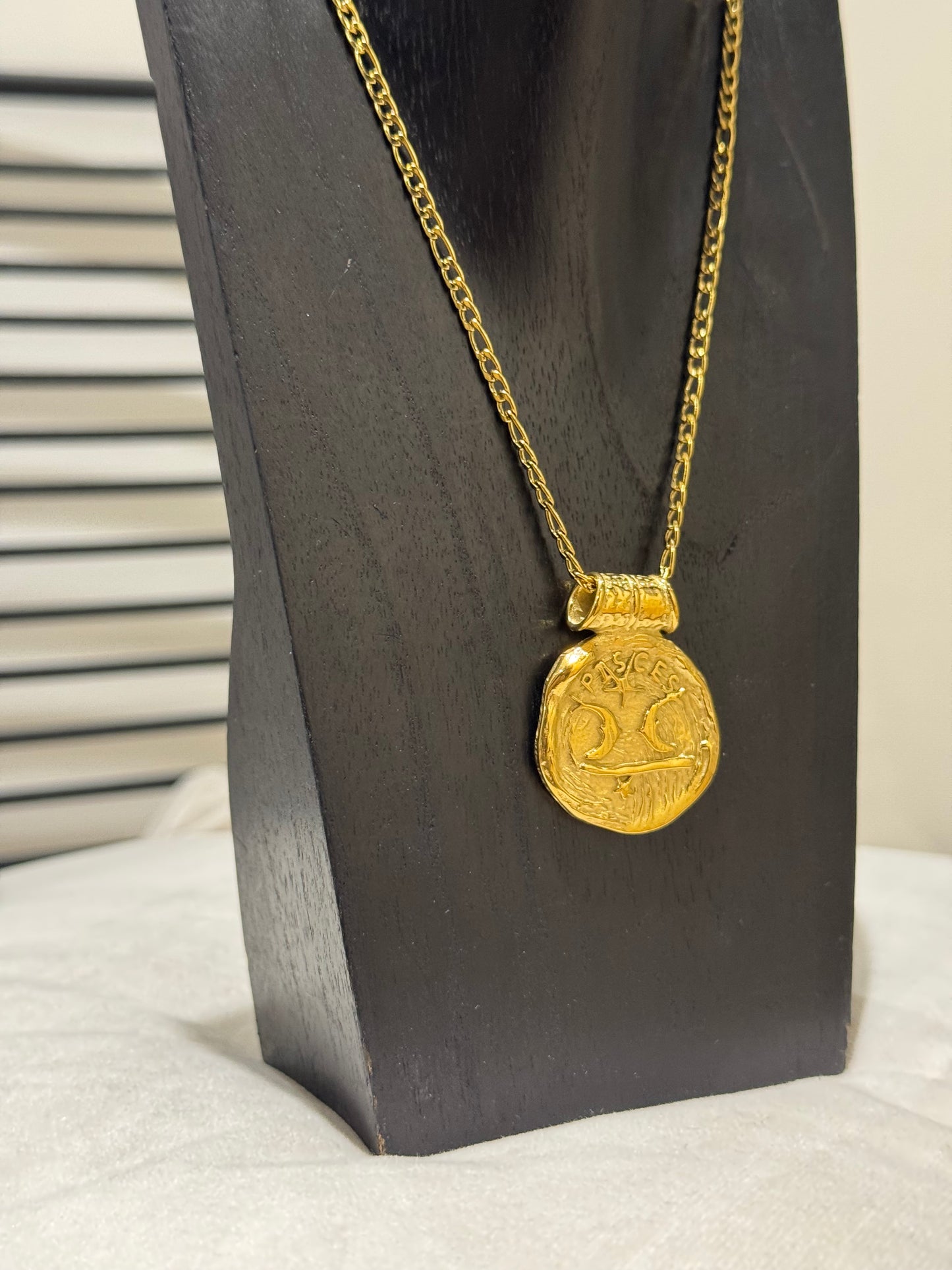 Collier Astro signe Poisson