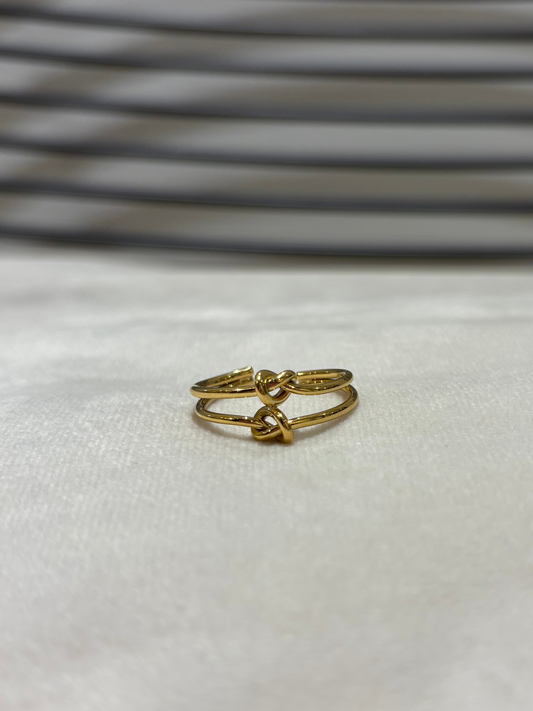 Bague dorée noeud