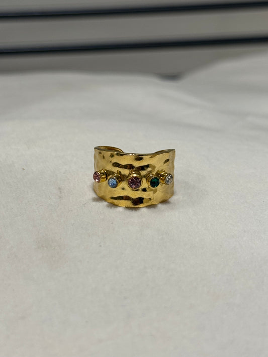 Bague dorée à pierres colorées